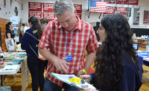 TIMPROCT board member speaks to student