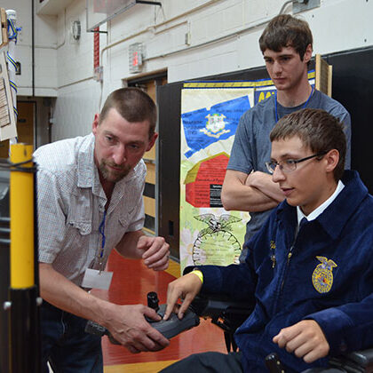 Assisting students at a Future Farmers of America workshop